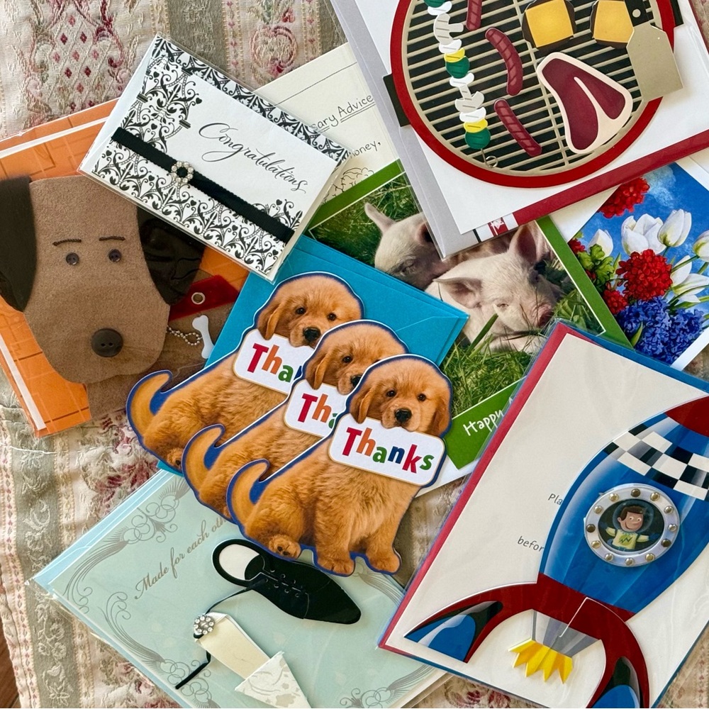 collection of 12 assorted greeting cards that feature various designs and themes